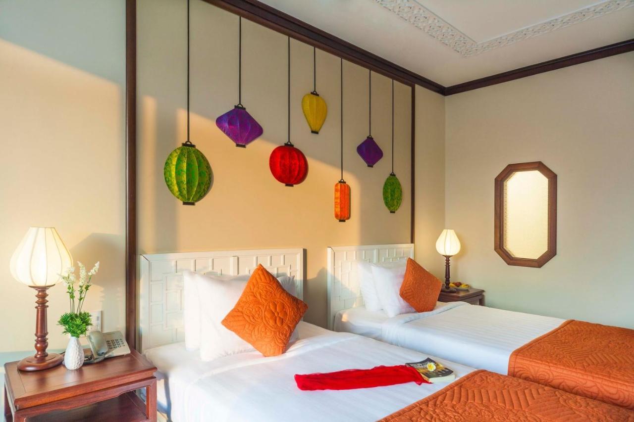 Cozy Savvy Boutique Hotel Hoi An Exterior foto A room at the hotel