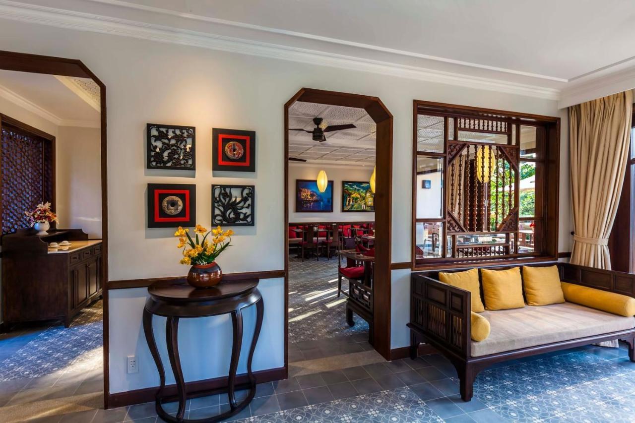 Cozy Savvy Boutique Hotel Hoi An Exterior foto Interior of a suite at the hotel