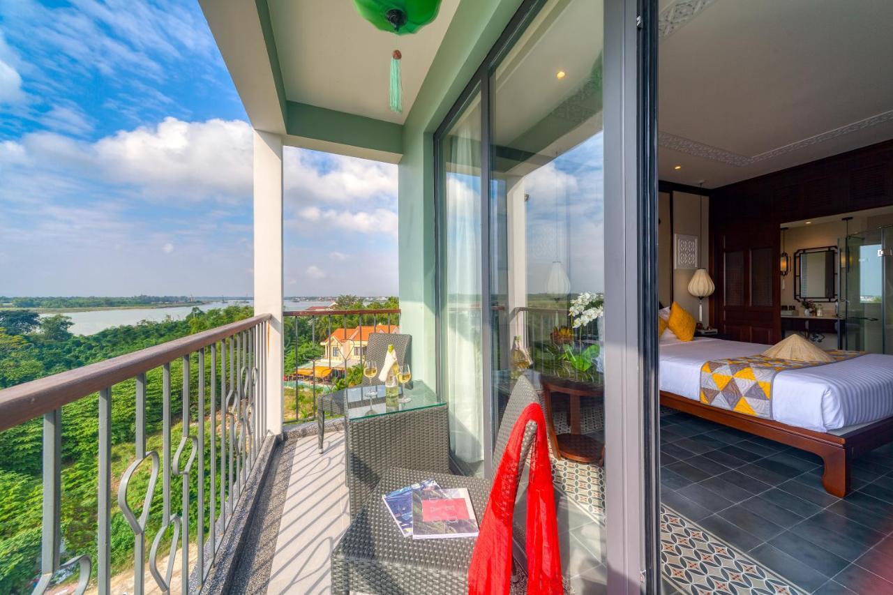 Cozy Savvy Boutique Hotel Hoi An Exterior foto A view of the river from a hotel room