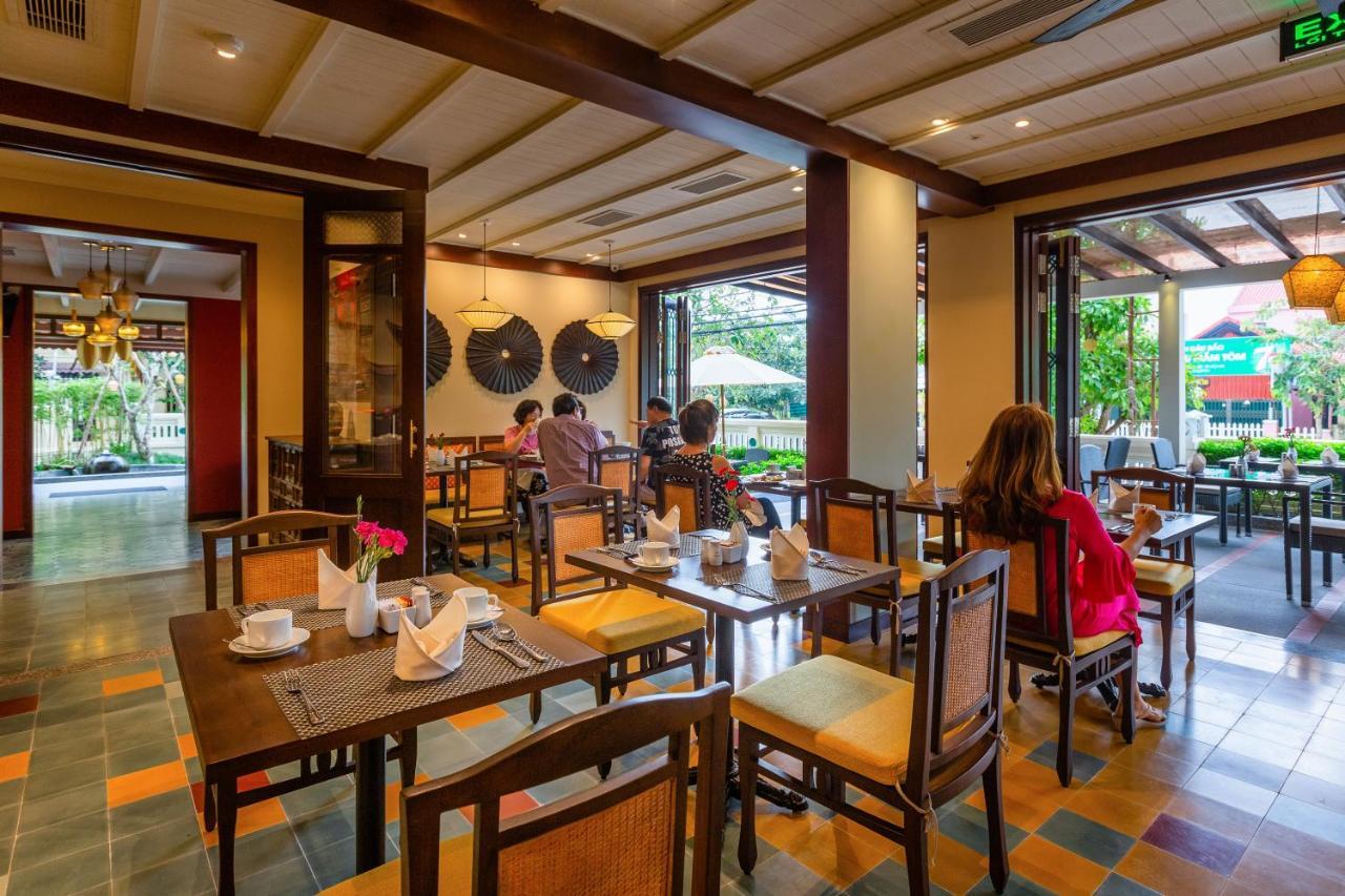 Cozy Savvy Boutique Hotel Hoi An Exterior foto The interior of the restaurant