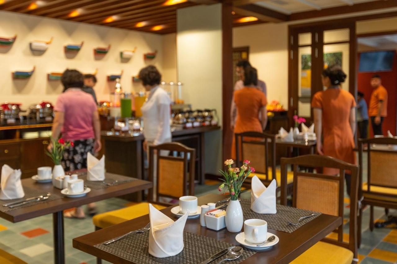 Cozy Savvy Boutique Hotel Hoi An Exterior foto The restaurant at the hotel
